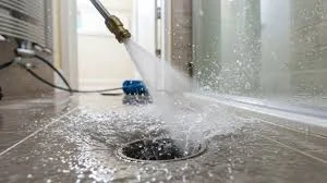 Hot mix asphalt pothole repair with compaction equipment and water spray application